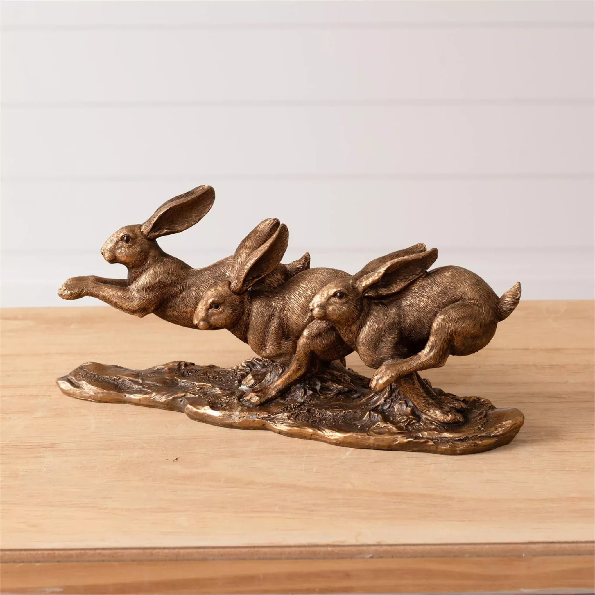 Golden Leaping Rabbits Figurine